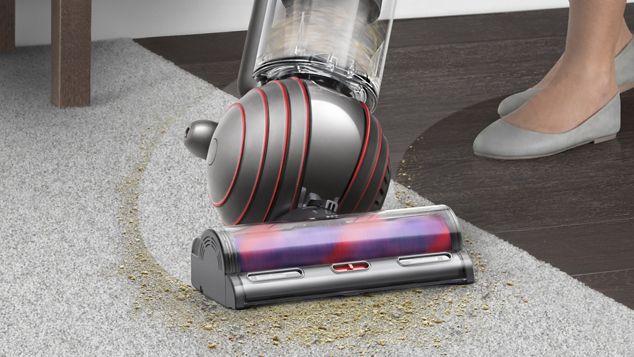 Demonstrating how the Dyson Ball&trade; glides around the floors on its ball.